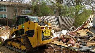 How to demo a  Garage with skid steer