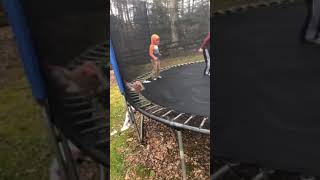 Little girl falls and gets stuck between springs of trampoline
