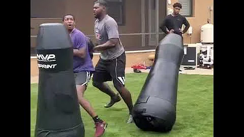 Jameis Winston and his trainer Otis Leverette ampi...