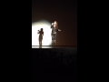 Sandy guo performaning a song in lincoln high school while being judge for the singing contest