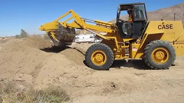 Full Bucket Of Dirt Wheel Loader