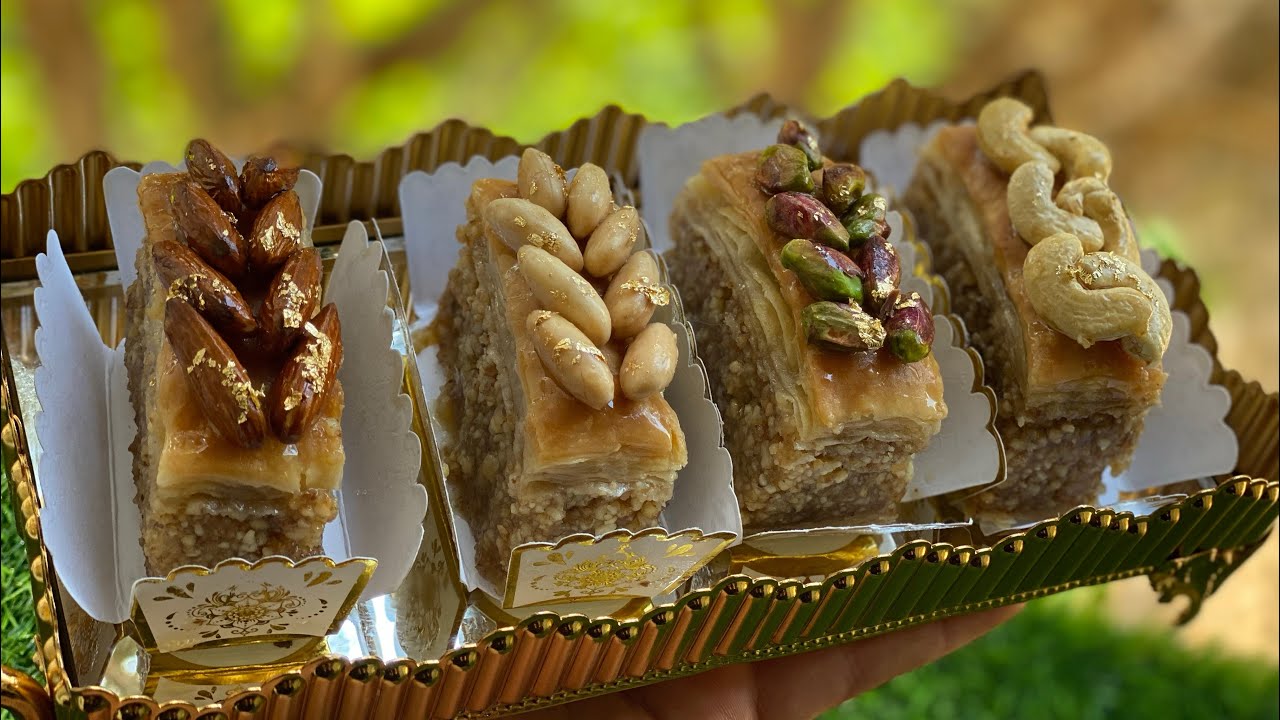 ميحلاش العيد بلا بيها ملكة الحلويات بقلاوة بدون الة توريق سهلة وسريعه ومبسطة والنتيجه مبهرة سيدتي