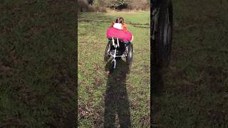 Trekinetic GTE All Terrain Power Wheelchair Over Grass in a Deep Wet Muddy Field