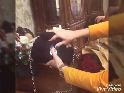 შავი ხელნაკეთი ჩანთა