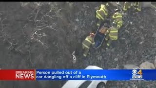 Person pulled out of car dangling off cliff in Plymouth