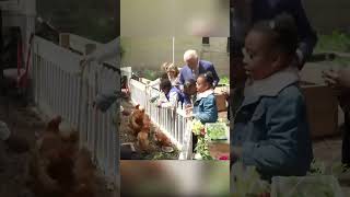 Watch: King Charles shows his fun side as he feeds chicken with kids in Harlem