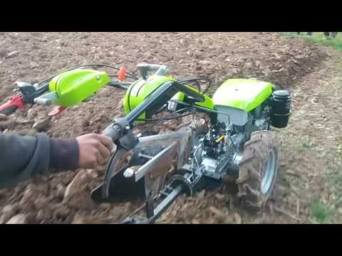 Vídeo: Segadora per a tractor a peu: trieu amb prudència