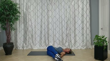 Supine Spinal Twist with Extended Legs Stretch