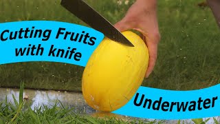 Cutting And Slicing Fruits With Knife Underwater