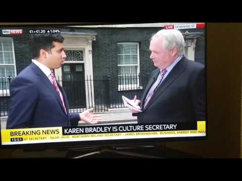 Adam boulton sheepish look as he drops his pen