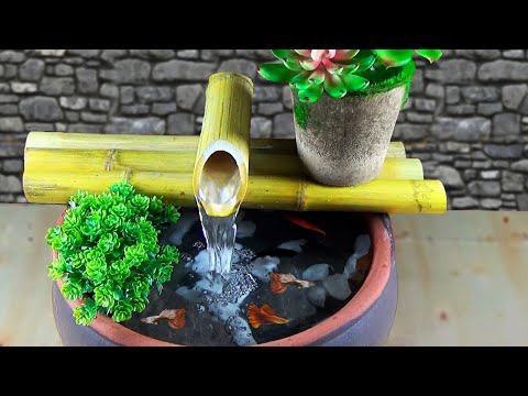 Video Ý tưởng bể cá thác nước siêu dễ từ tre và chum đất - youtube