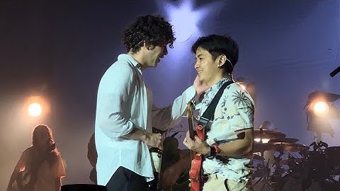 Thumbnail of The 1975 - Robbers (A fan playing the guitar🎸✨) (Live in Bangkok, Thailand) @IMPACT Arena