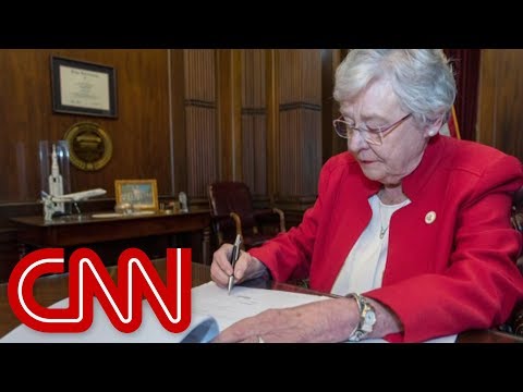 Alabama governor signs near-total abortion ban into law