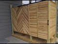 Outdoor Shower with Barn Door Made from Cedar Fence Planks LP Gas Water Heater
