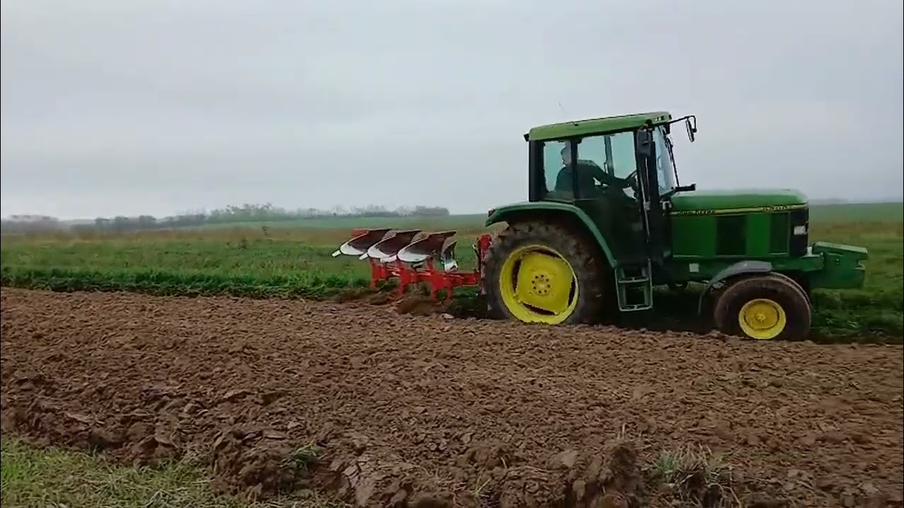 Oranje John Deere 6200 2WD i plug Vogel Noot 800