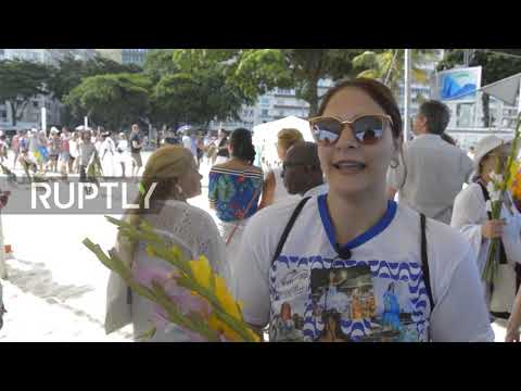 Devotees honour sea