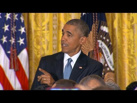 Obama heckled at LGBT event