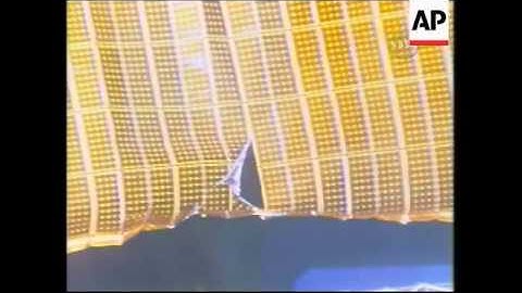 Views of ISS after spacewalk, reax on solar panel rip