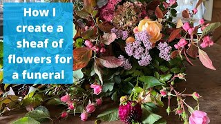 How to create a sheaf of flowers for a funeral.