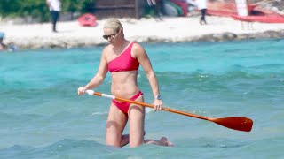 Lindsey Vonn looks incredible in a bright red bikini as she goes paddle boarding