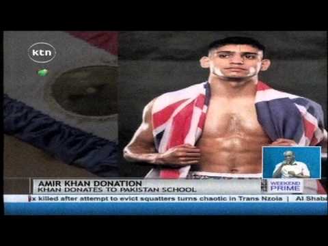 British Boxer Amir Khan donates 30, 000 pounds pair of shorts to Pakistan Army-run School