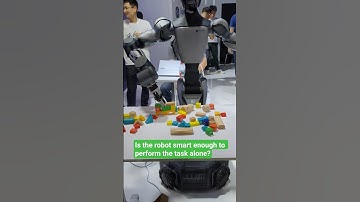 robot stacks building blocks at World Artificial Intelligence Conference Shanghai #ai