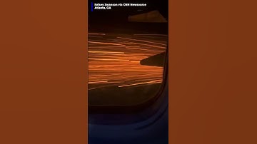 A passenger captured this video of sparks flying out of one of the plane