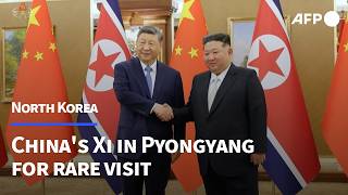 China's Xi in North Korea for rare visit | AFP