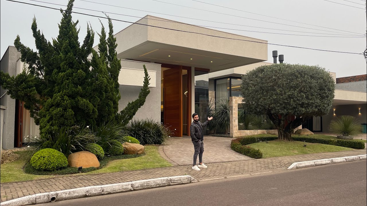 CASA TÉRREA COM 450M² DE EXTREMO LUXO, FINAMENTE DECORADA À VENDA NO VELAS DA MARINA EM CAPÃO!