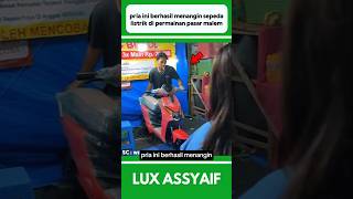 Pria Ini Berhasil Menang Sepeda Listrik Di Permainan Pasar Malam