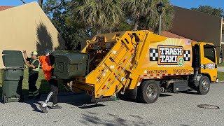 Trash Taxi Isuzu Mini Pac Mac Rear Loader Garbage Truck Packing Post Christmas Trash at a Resort