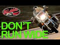 Why motorcycle riders run wide in corners