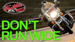 Why motorcycle riders run wide in corners