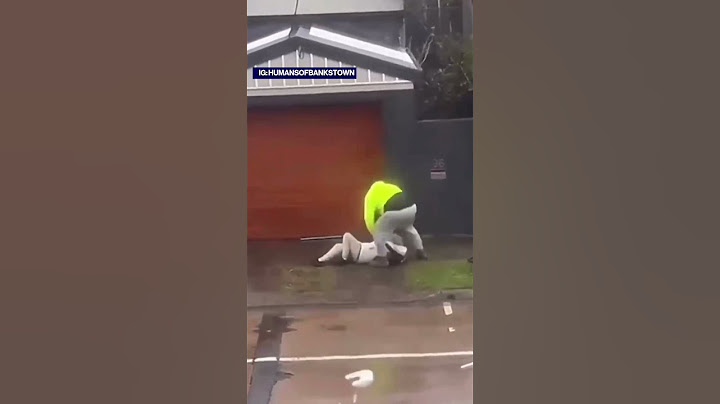Sydney ‘rain bomb’ wind sees woman knocked  over by cardboard box