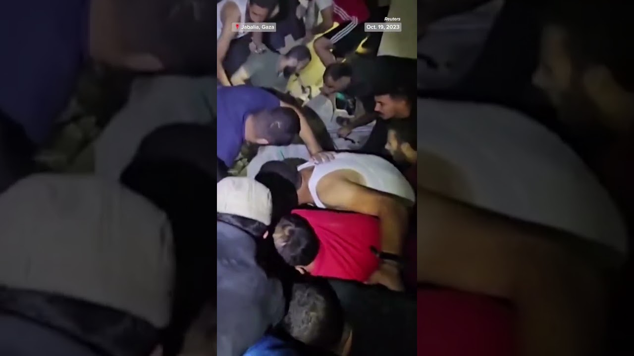 Palestinians rescue children trapped under rubble after airstrike