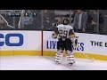 Marc-Andre Fleury gives a Sharks stick away to fans