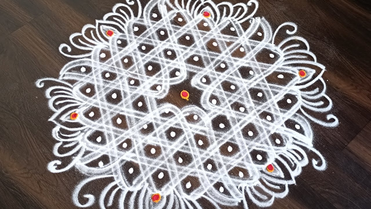 Karthigai Special Sikkukolam using 9-5 inter dots