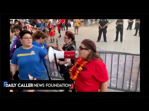 protesters-harass-the-police-in-houston-outside-the-debate