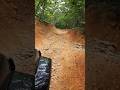 Jeep Gladiator creeping along Uwharrie nat park Badlin Lake Slab Pile trail