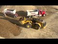 (NEW) Caterpillar 980m loading gravel (Ariel view)