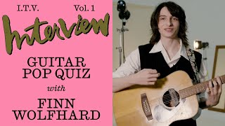 Finn Wolfhard Gets Challenged by Mackenzie Davis to Play Iconic Film Scores on His Guitar