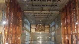 Double spreader discharge containers