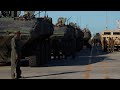 U.S. Marines load 18 Amphibious Combat Vehicles aboard the amphibious assault dock landing ship