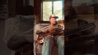Capps on the bass neck Eddie on my lap #countrymusic #jimmycaps #rockabilly #bassvi #music #dog