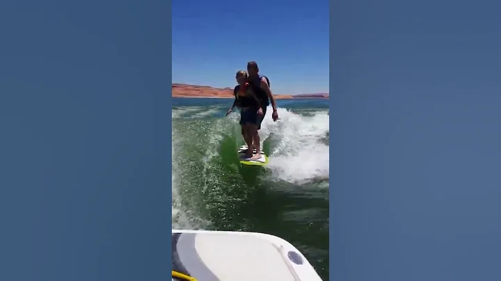 Surfing at Lake Powell behind 99 Tige 21V Riders E...