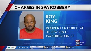 Man facing more than a dozen charges after allegedly robbing multiple Indianapolis spas at gunpoint