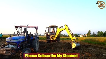 Sonalika tractor & Mahindra Earthmaster Loading Soil - Mahindra Backhoe Loader