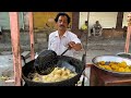 Hardworking man making early morning breakfast - Indian Street Food