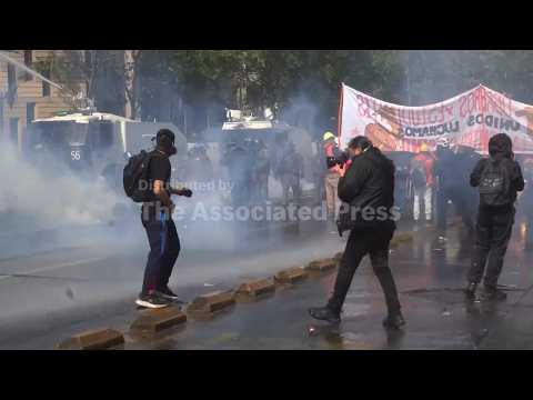Protesters clash with police over Chilean government’s planned education budget cuts