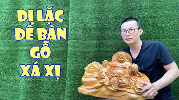 Tượng Di Lặc Cầm Đào Gỗ Xá Xị – Biểu Tượng May Mắn & Trường Thọ